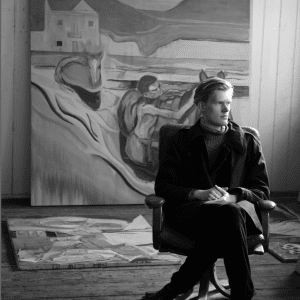 Huddie Hamper in front of his work, The Crossing