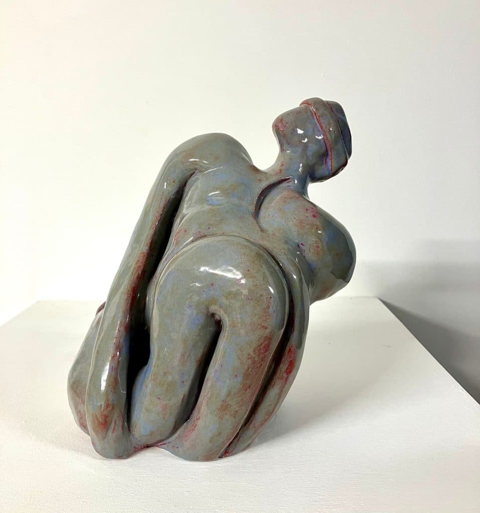 Ceramic figure with blindfold